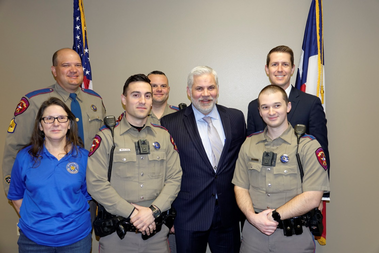 Left – Sgt. Dean Barnhill, Gloria Eason, Tr. Bruno Miauro, Tr. John Sullivan, DA Brett Ligon, Tr. Ben Polansky, ADA Andrew James