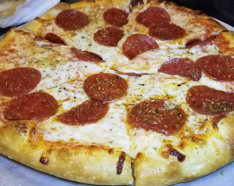 Pepperoni Pizza - Pepperoni, san marzano tomato sauce, fresh mozzarella, parmesan, oregano. Photo by Nick Rama