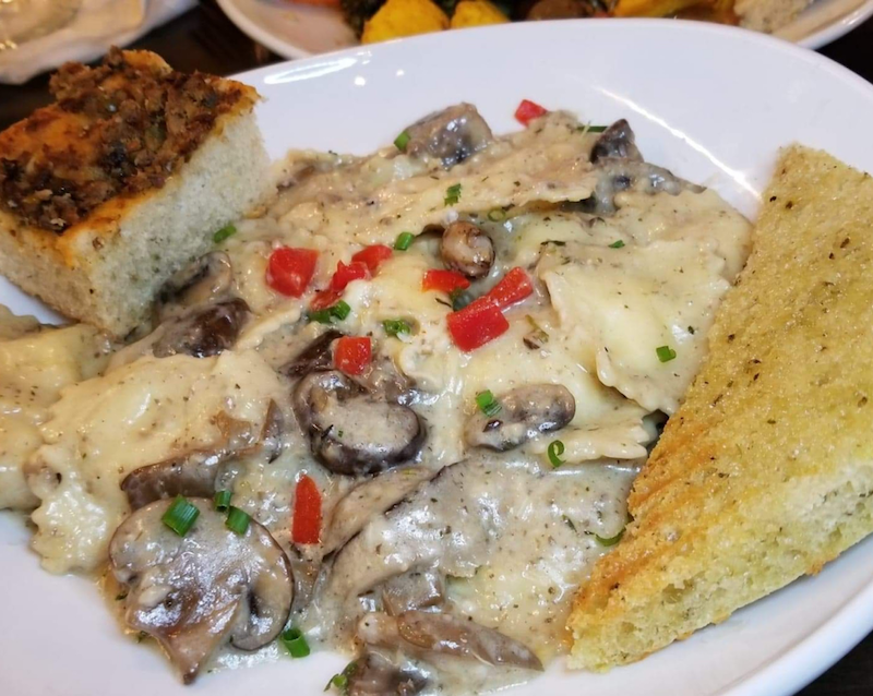 Cheese Ravioli - House made four cheese ravioli, creamy mushroom sauce, mushroom medley, parmesan, white truffle oil. Photo by Nick Rama