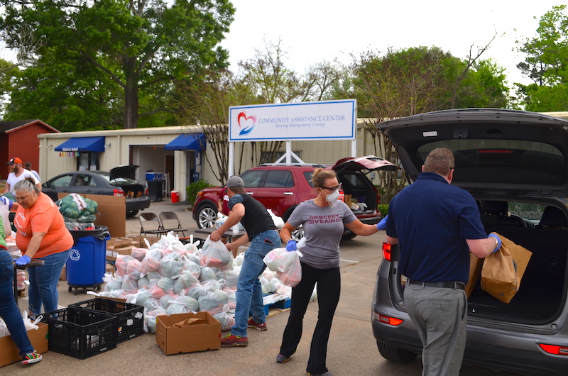 COMMUNITY ASSISTANCE CENTER SERVES NEIGHBORS IN NEED WITH DRIVE THRU GROCERIES