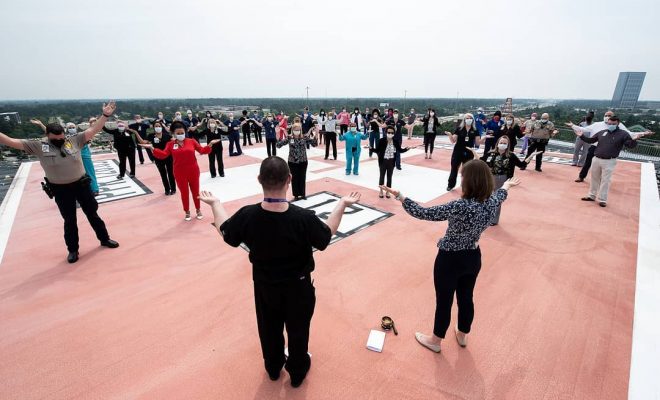 Memorial Hermann staff pray for Physicians and Community on Helipad