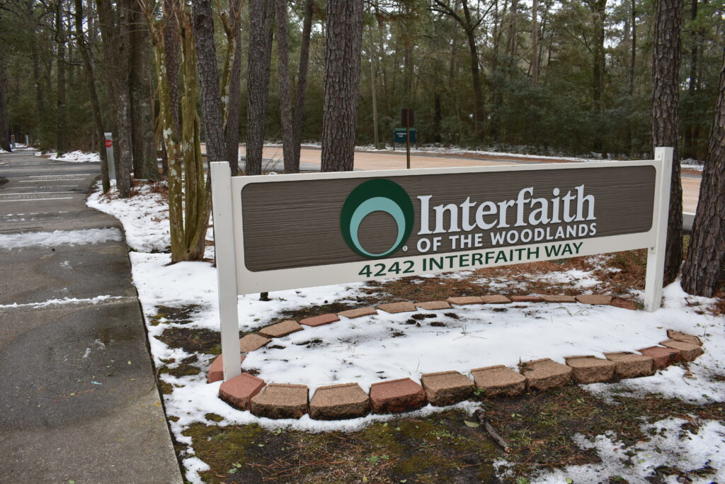 Interfaith of The Woodlands staff assist neighbors with food, grocery gift cards and gas cards at Drive Through Food Distribution this week.