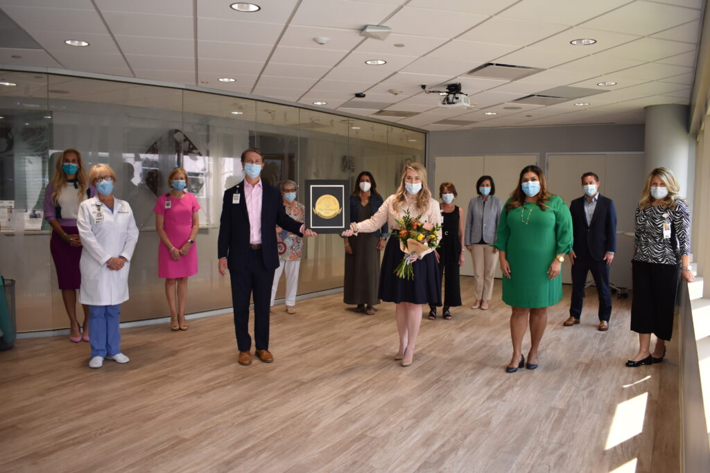 Pictured L-R, Front Row: Catherine Giegerich, Vice President & Chief Nursing Officer, Memorial Hermann The Woodlands Medical Center; Justin Kendrick, Senior Vice President & Chief Executive Officer, Memorial Hermann The Woodlands Medical Center; Amanda Poole, Manager, Canopy Cancer Survivorship Center; Lucy Gomez, Vice President Programs & Operations, Interfaith of The Woodlands Back Row: Missy Herndon, President & CEO, Interfaith of The Woodlands; Linda Nelson, Director of Business Development, Memorial Hermann The Woodlands Medical Center  pictured with staff and volunteers.