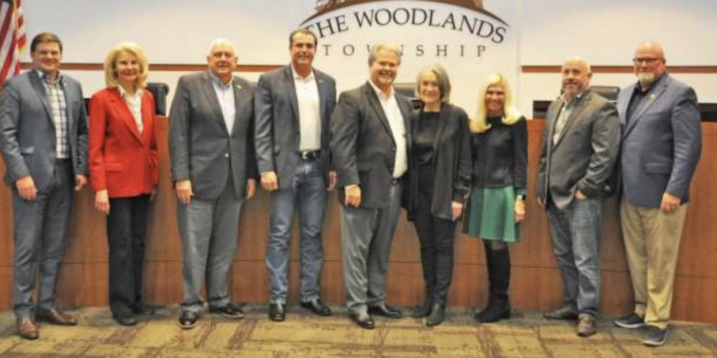 The Woodlands Township honored Assistant General Manager for Community Services John Powers on his retirement after 23 years with the organization. Pictured above, left to right, are Township Directors Jason J. Nelson, Dr. Shelley Sekula-Gibbs, Bruce Rieser, Chairman Gordy Bunch, Assistant General Manager John Powers and his wife Debbie, Township Directors Dr. Ann K. Snyder, John Anthony Brown and Bob Milner.