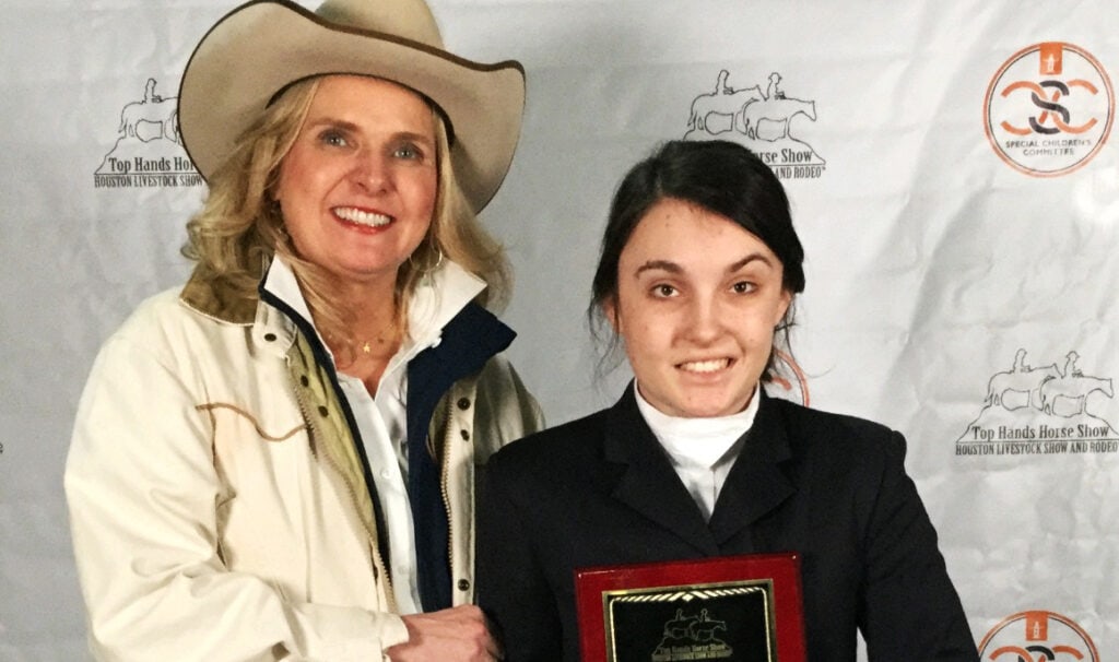 Cadie Darnell Accepts Top Rider Award Inspiration Ranch HLSR Top Hands