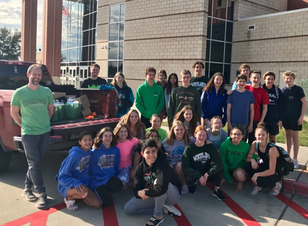 The Woodlands Swim Team donates to Meals on Wheels Montgomery County birthday bags 2022 Jarrod Murphy