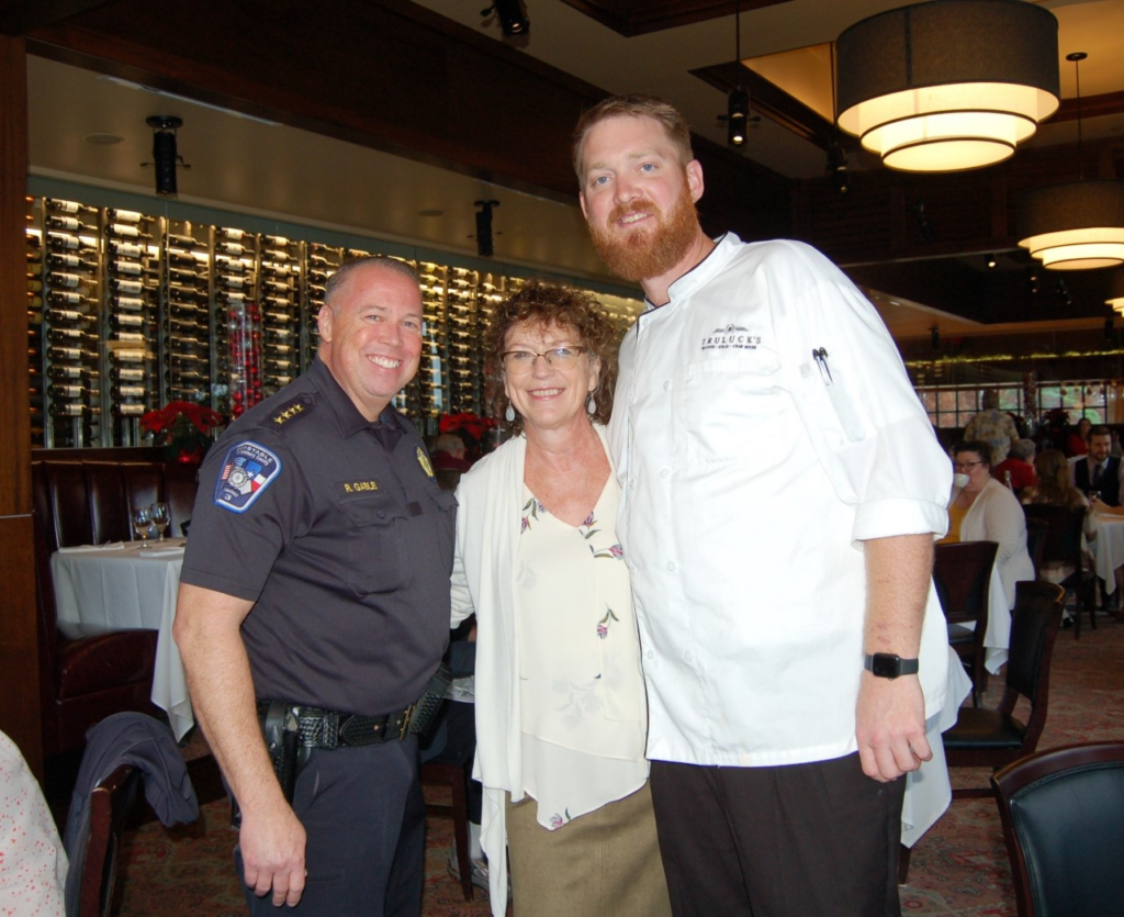 Montgomery County Precinct 3 Constable Ryan Gable; Dr. Victoria Constance, Executive Director of Children’s Safe Harbor; and Reid Powell, Banquet Captain at Truluck’s The Woodlands