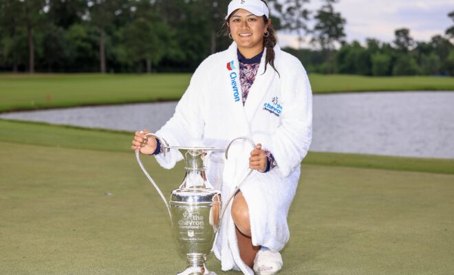 THE WOODLANDS, TEXAS - APRIL 23: Lilia Vu of the United States celebrates with the trophy after winning in a one-hole playoff during the final round of The Chevron Championship at The Club at Carlton Woods on April 23, 2023 in The Woodlands, Texas. (Photo by Carmen Mandato/Getty Images)