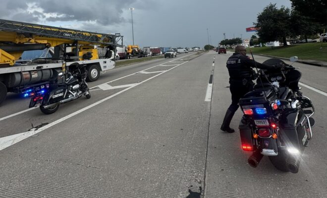 Armed Suspect shuts down main lanes of I-45 North Freeway near Cypresswood Dr
