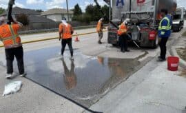 Precinct 3 applies High-Friction Surface Treatment to improve safety on Rayford Road’s S Curve