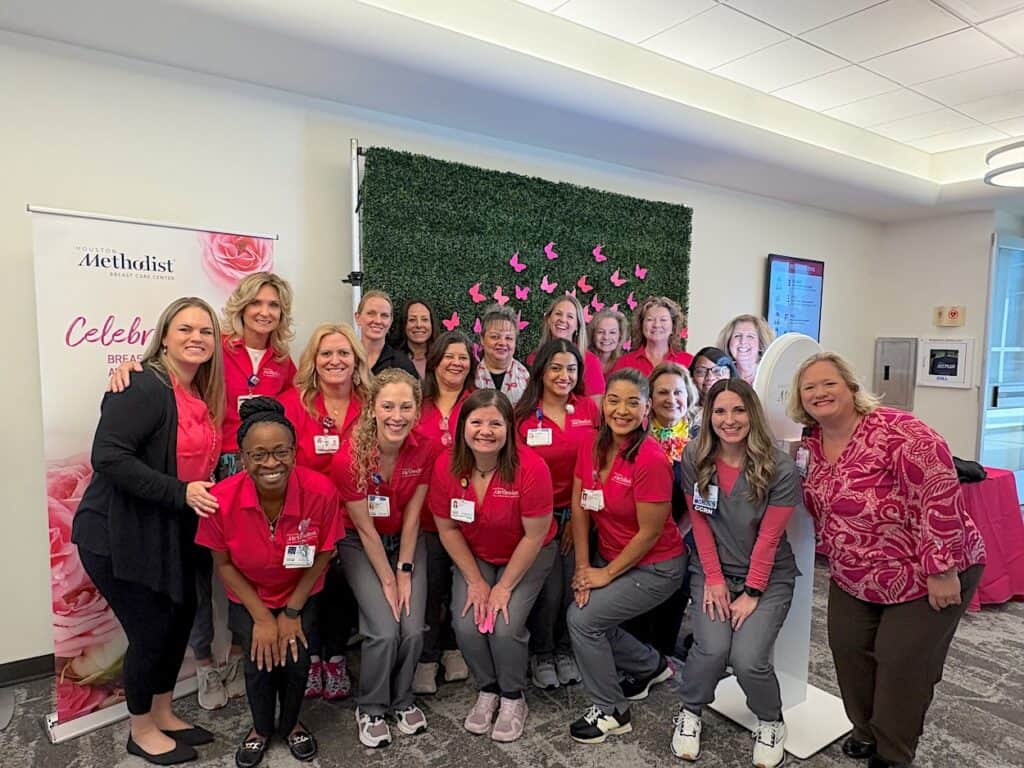 The staff at Houston Methodist Breast Care Center at The Woodlands wearing pink for Breast Cancer Awareness Month.