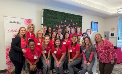 The staff at Houston Methodist Breast Care Center at The Woodlands wearing pink for Breast Cancer Awareness Month.