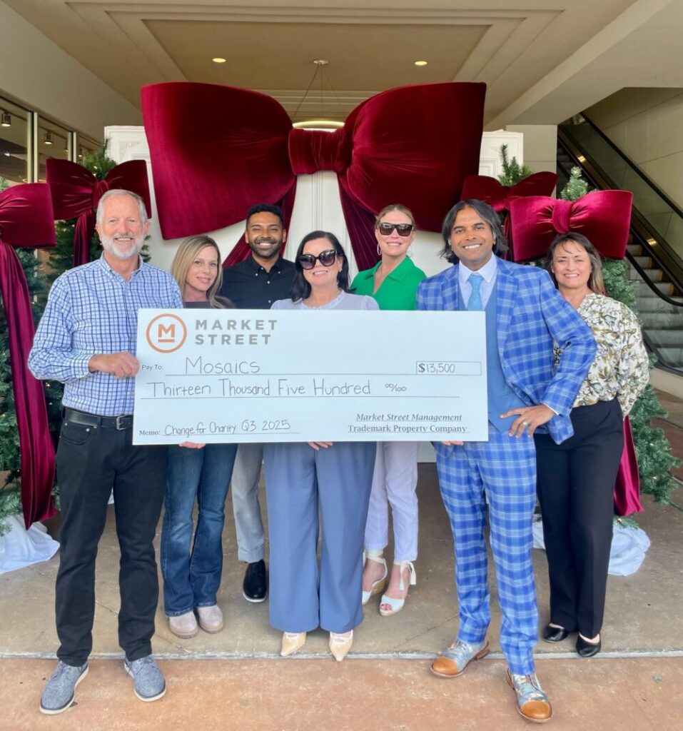 Pictured from left to right: Bill Buck, Mosaics Board Director; Dana Pritchard, The Woodlands Car Club; John Pearson, Marketing Director at Market Street; Jamie Freels-Runey, Mosaics Executive Director; Elisabeth Stavinoha, Mosaics Director of Development; Dr. Paulraj Samuel, Mosaics Board Chair; Jennifer Myers, Mosaics Community Outreach Coordinator.