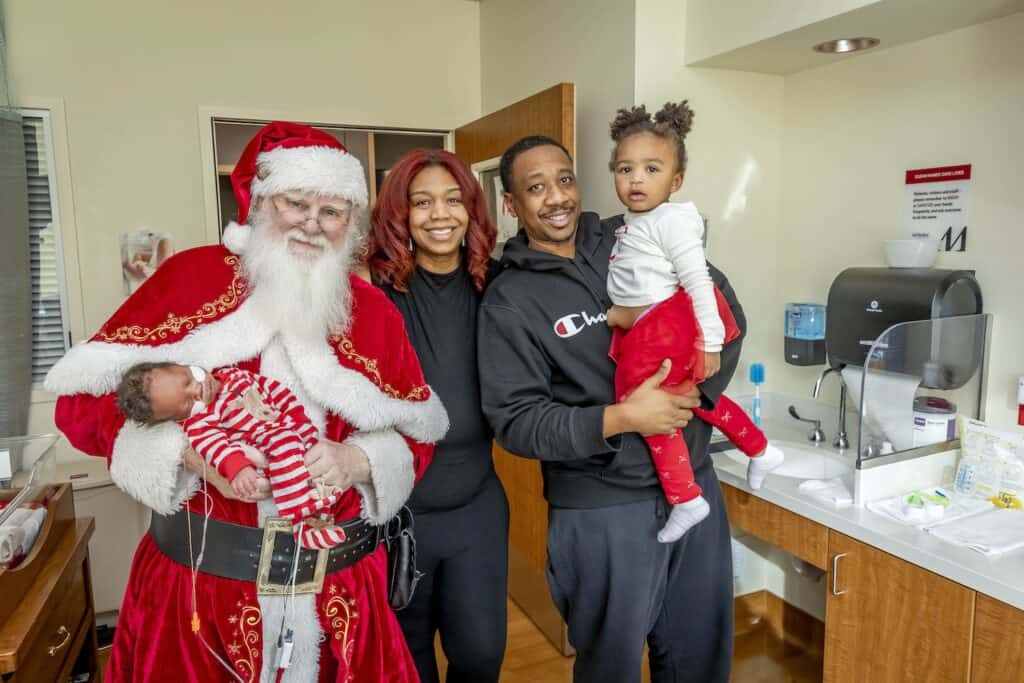Houston Methodist The Woodlands Hospital Santa Claus visit to NICU parents and patients December 11, 2025. (Photo by Richard Carson)
