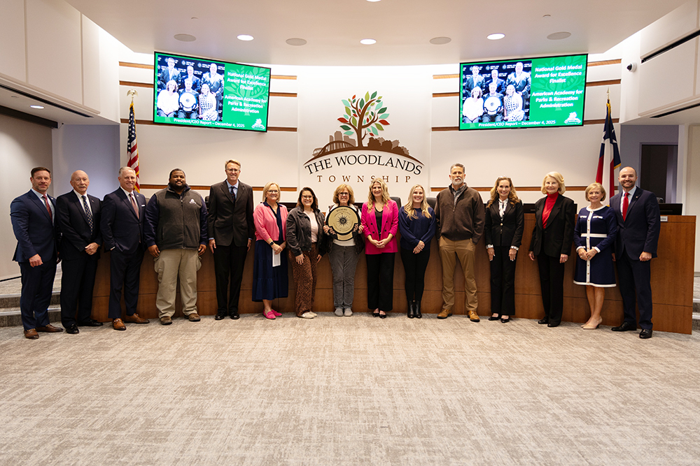 Photo of Board with members of Parks and Recreation staff
