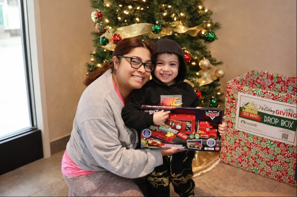 Family receives holiday gifts from Interfaith of The Woodlands