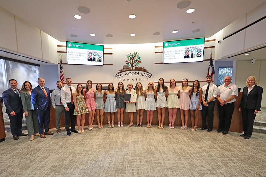 Board of Directors with the Lady Highlanders Swim
