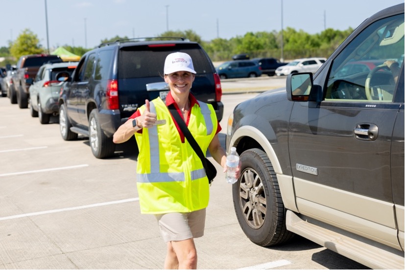 Kristine Marlow, outgoing President and CEO of Montgomery County Food Bank, at a mobile food distribution.