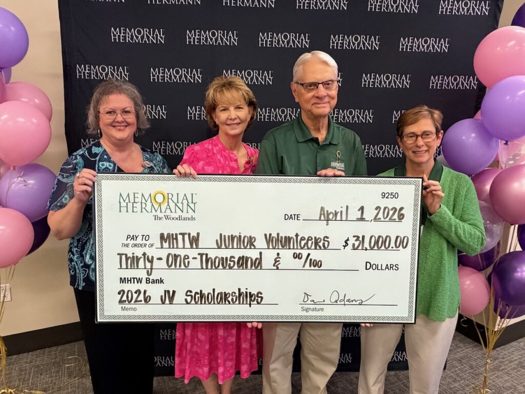 Members of the Memorial Hermann The Woodlands Auxiliary making the scholarship announcement at the appreciation dinner.