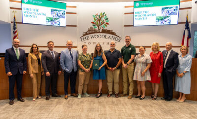 Board of Directors pictured with Special Events Supervisor Mark Lazenby, Special Events Coordinator Emma Kiel and members from Bike The Woodlands Coalition