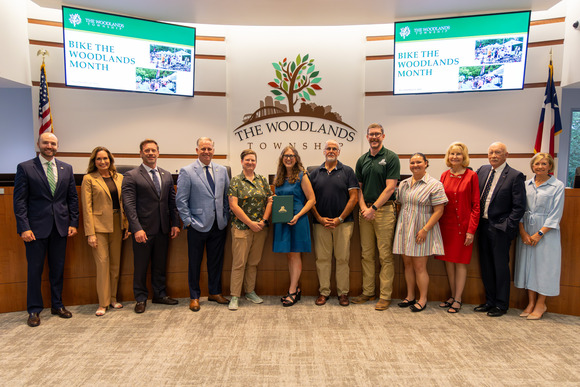 Board of Directors pictured with Special Events Supervisor Mark Lazenby, Special Events Coordinator Emma Kiel and members from Bike The Woodlands Coalition