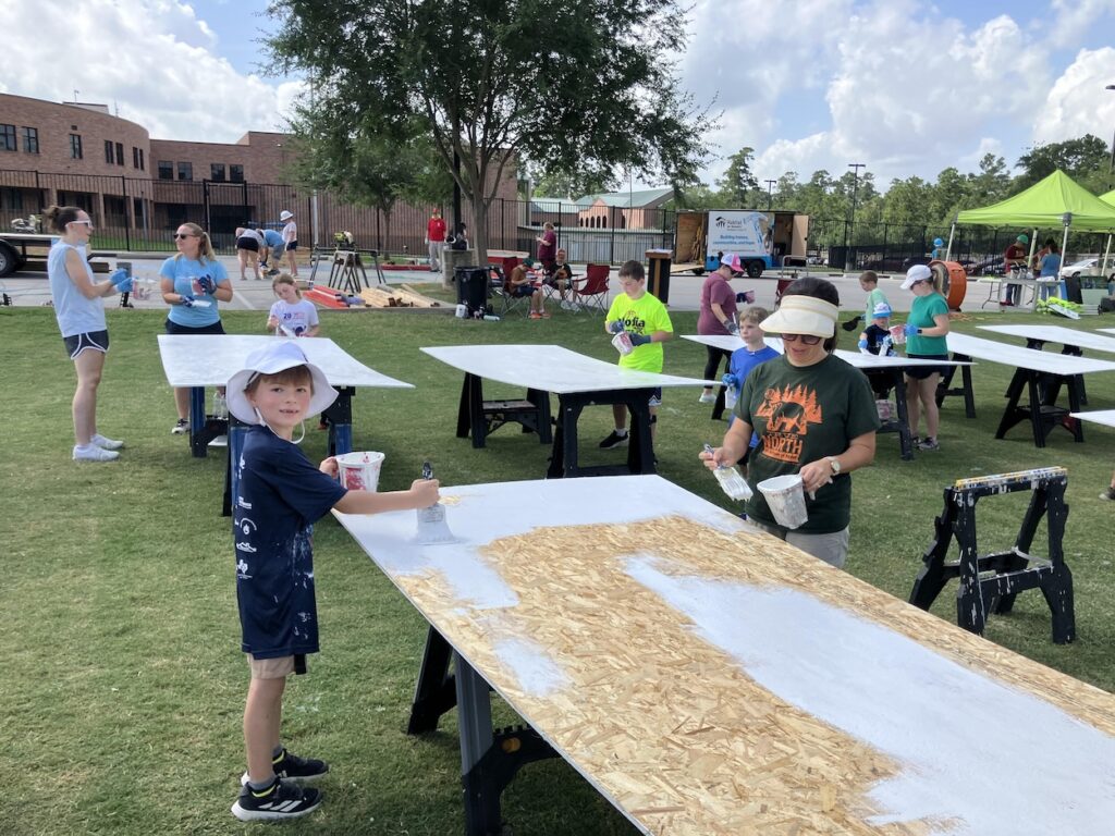 Family Volunteers Building Sheds
