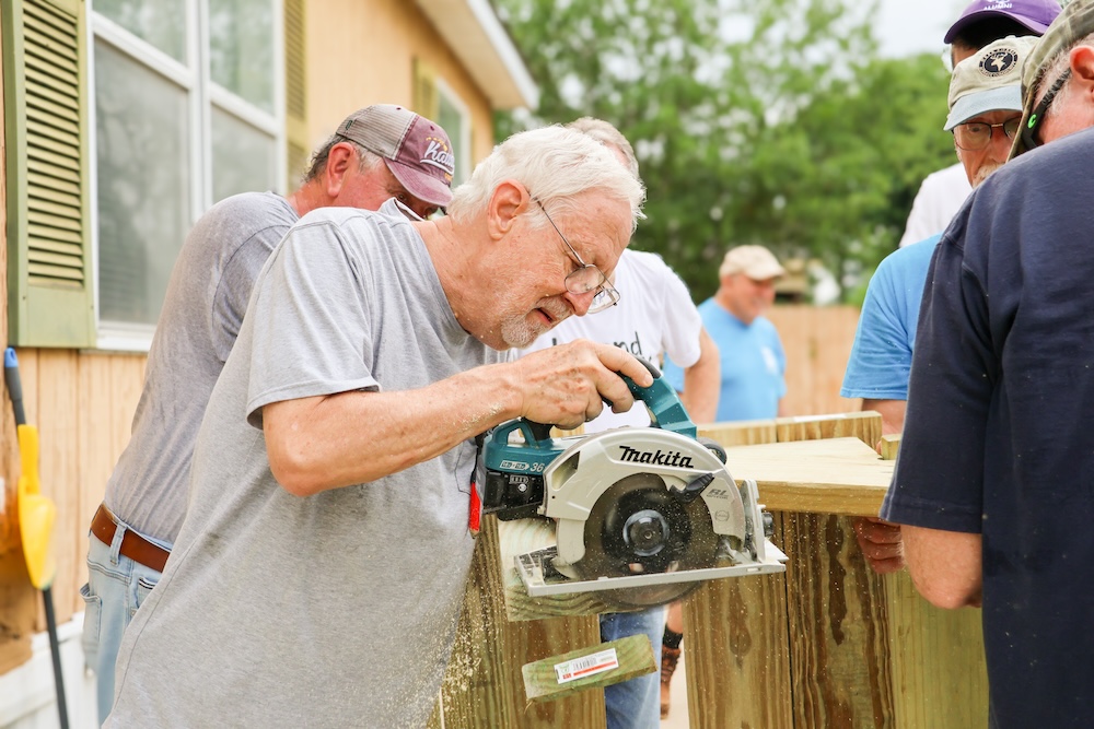 Volunteers build safe, new stairs for a local homeowner in need
