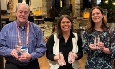 Pictured above are Township Senior Communications Specialist Perry Frank, Director of Communications LeaAnn Petersen and Graphic Designer Jaclyn Ballou, along with the awards from the 2026 Texas Association of Municipal Information Officers (TAMIO) competition.