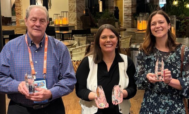Pictured above are Township Senior Communications Specialist Perry Frank, Director of Communications LeaAnn Petersen and Graphic Designer Jaclyn Ballou, along with the awards from the 2026 Texas Association of Municipal Information Officers (TAMIO) competition.