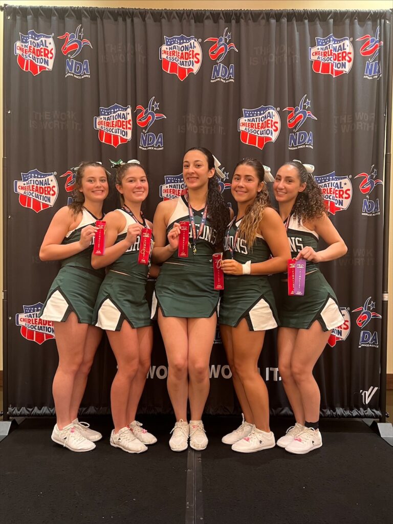 The John Cooper School Dragon Cheerleaders returned from this year's NCA Leadership Camp with numerous team and individual honors, highlighted by Game Day Champion, Rally Routine Champion, Best Overall Mascot, and the Spirit Stick Award.