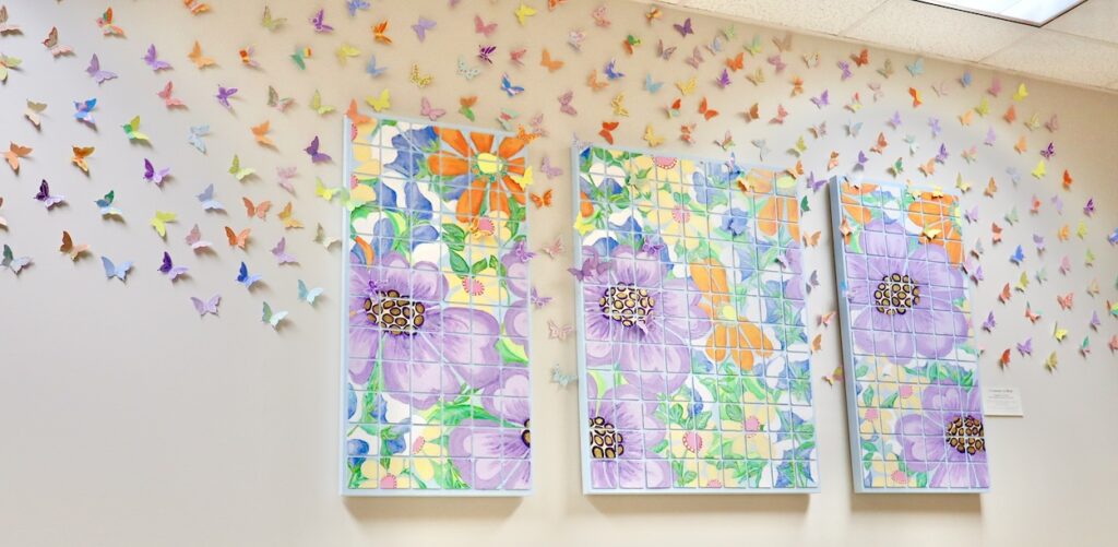 Collaborative Mural 'A Community in Bloom' installed at Canopy Cancer Survivorship Center
