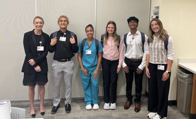 Students placed at Houston Methodist Hospital The Woodlands with their host Emily Calver