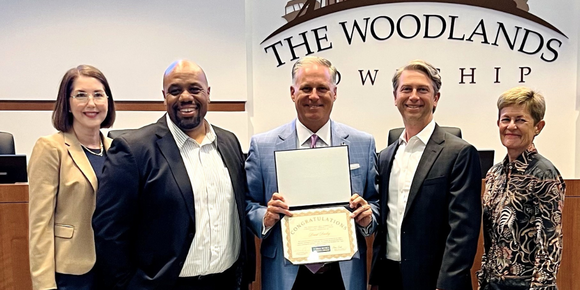 Pictured, left to right, Heather Ramsey with The Woodlands Area Chamber of Commerce, Chamber CEO Aaron Cox, Township Chairman Brad Bailey, Chamber Chairman Justin Kendrick and Past Chairman Julie Ambler.