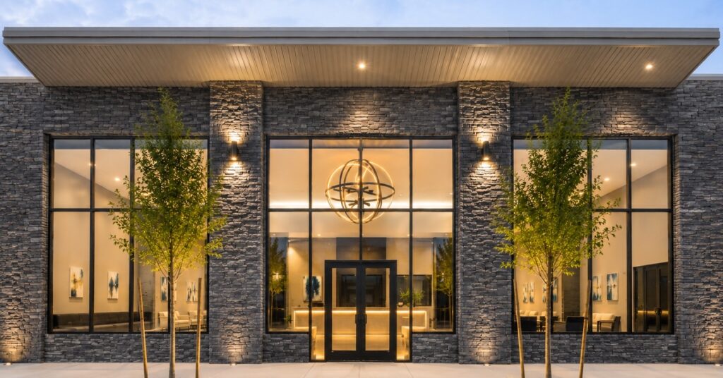 Discovery School of Innovation’s new six-acre campus in The Woodlands area features a modern stone façade and welcoming entrance.