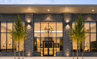 Discovery School of Innovation’s new six-acre campus in The Woodlands area features a modern stone façade and welcoming entrance.