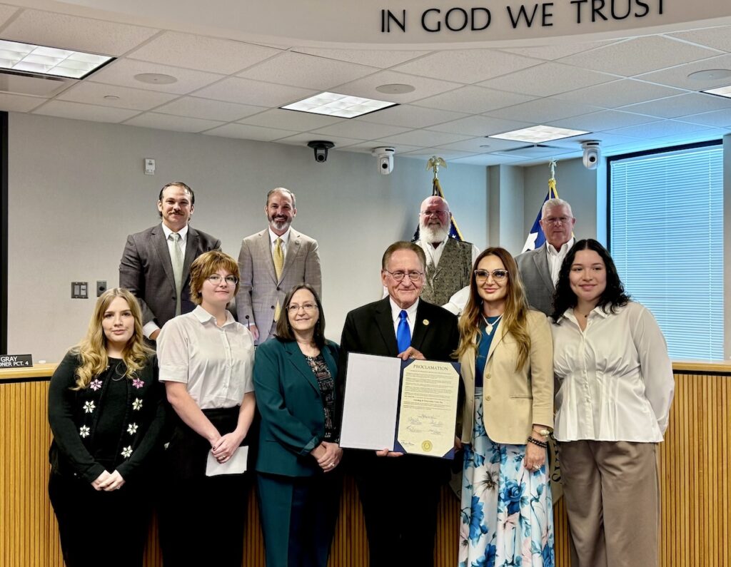 Genealogy Team with Judge Keough, Commissioners & Library Director Dr. Janna Hoglund (5th from left)