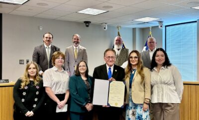 Genealogy Team with Judge Keough, Commissioners & Library Director Dr. Janna Hoglund (5th from left)