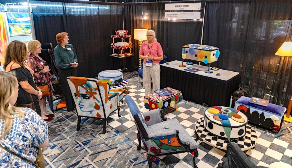 Textile artist Mary Beth McGinnis leads an artist booth talk during The Woodlands Fine Craft, Art & Design Show.