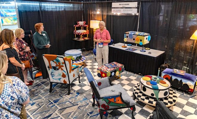 Textile artist Mary Beth McGinnis leads an artist booth talk during The Woodlands Fine Craft, Art & Design Show.