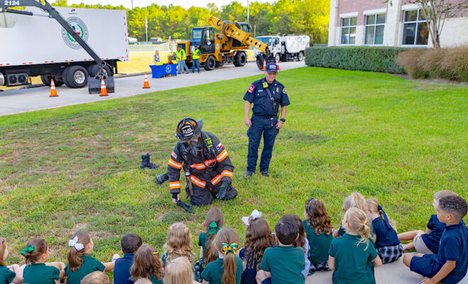 Community Helpers share Touch-a-Truck experience with TWCA students